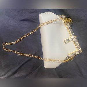 Fendi First Small
White leather bag with exotic Python details